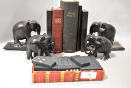 Two ebonised book ends having elephants to each, also two similar elephants, dominos, an album