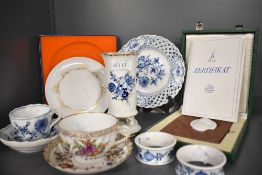 A selection of retrospective Meissen items including commemorative plaque and a Dresden cup and