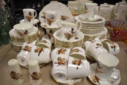A 1960s FR Gray and sons ltd partial dinner service 'Aldridge' to include plates,cups,mugs, saucers,