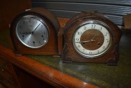 Two 20th century mantle clocks both having oak cases one by Anvil and similar Smiths