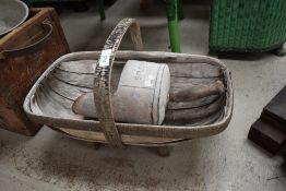 A vintage wooden trug and a grain scoop with wooden handle,'Silcocks' embossed to front.