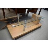 A 20th century modern laminate and glass coffee table