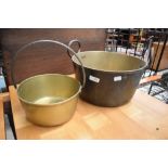 Two vintage brass jam pans.