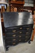 A reproduction Victorian Aesthetic styled bureau having serpentine front