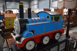 A 20th century hand made Thomas the Tank Engine sit on toy train