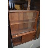A vintage teak bookcase with cupboard under, nice proportions, width approx. 76cm