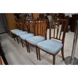 A set of reproduction dining chairs
