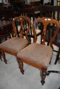 A pair of Victorian balloon back dining chair with mahogany frames