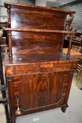 A 19th century mahogany chiffonier of small proportions having scroll and turn supports and bead