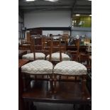 A set of four Victorian mahogany salon chairs