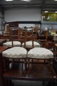 A set of four Victorian mahogany salon chairs