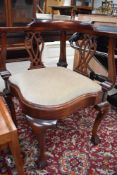 20th century reproduction corner chair having carved back and cabriole legs