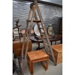 A set of 20th century decorators wooden step ladders
