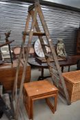 A set of 20th century decorators wooden step ladders