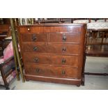 A Victorian chest of two over three drawers with additional drawer top mahogany frame and turned