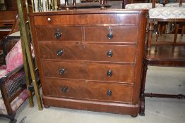 A Victorian chest of two over three drawers with additional drawer top mahogany frame and turned