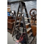A set of 20th century decorators wooden step ladders