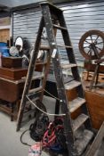 A set of 20th century decorators wooden step ladders