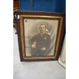 An early 20th century photographic print of a Naval or similar military officer