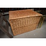 A 20th century large wicker woven basket or laundry hamper