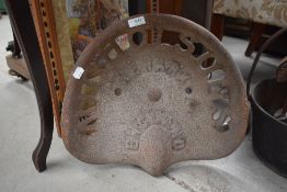 A vintage farm machinery implement or tractor seat marked Newark England