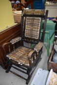 A 19th Century stained frame American rocking chair