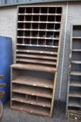 A 20th century metal cased industrial or garage shelf set