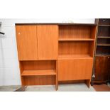 A pair of mid century two G Plan wall shelf units