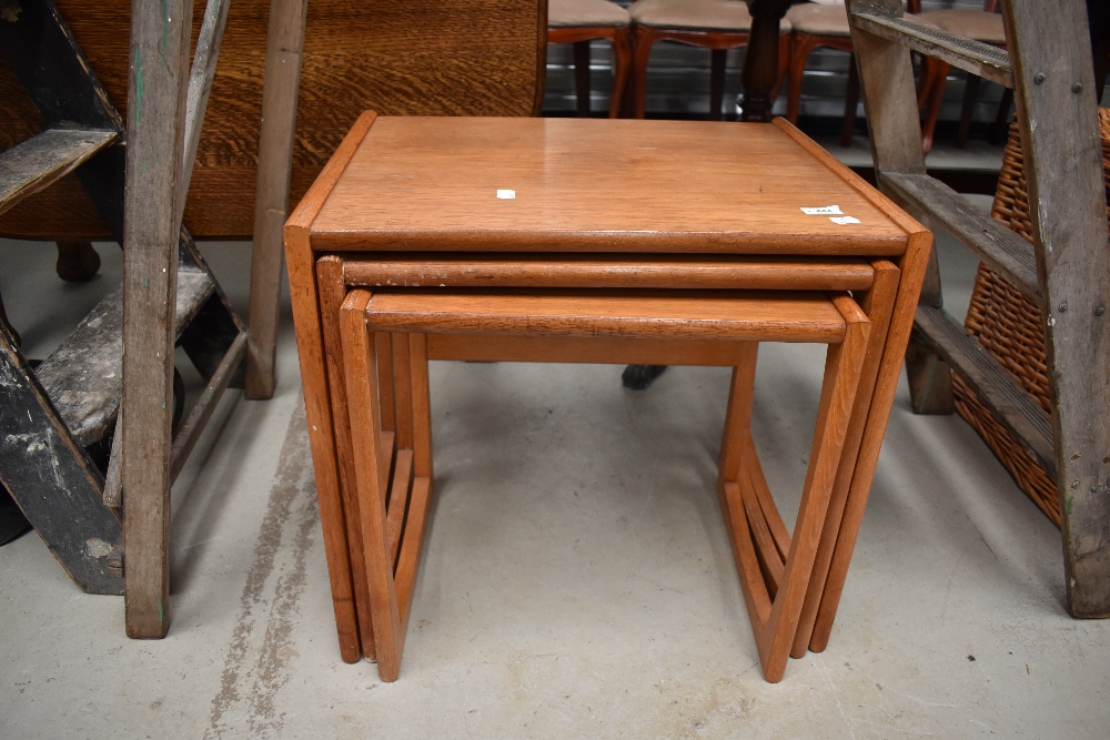 A stylised teak nest of tables, probably G plan