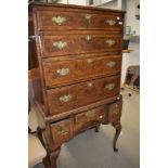 An early 20th century good quality Queen Anne style reproduction tall boy chest on chest of four