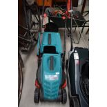 A Bosch Rotak 32R electric lawn mower.