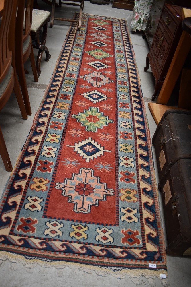 A traditional Kazak style carpet runner