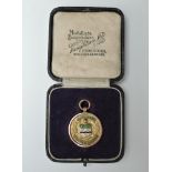 A 9ct Gold Blackburn & District Football Combination Medal with enamel on front, reverse Eddleston