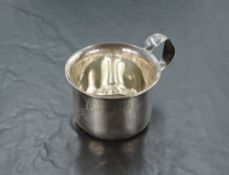 A Canadian Sterling .925 cup, of plain circular form with flared rim and loop handle, the body