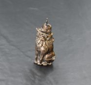A novelty cast white metal vesta case, formed as an anthropomorphic dog, unmarked, 6.5cm.