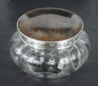 A George V silver and tortoiseshell lidded glass powder jar, the circular slightly domed cover