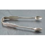 A pair of Victorian Irish silver sugar tongs of plain fiddle back form, Dublin 1854, James R