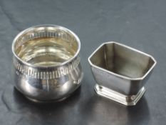 A small 1960's silver bowl, of squat baluster form with moulded rim and pierced geometric band,