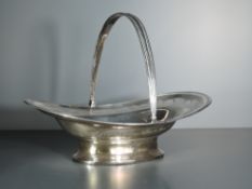 A Georgian silver table basket having leaf and scallop shell etched decoration and swing handle,