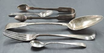 A George III silver fiddle pattern table spoon, engraved initials to terminal and pip reverse, marks