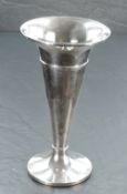 A silver vase of plain trumpet form having a weighted circular base, Birmingham 1922, makers mark