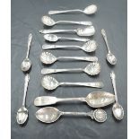 A group of mixed silver spoons, including a set of eight Portuguese .833 grade white metal 'Fayal'