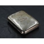 A Victorian silver cigarette case, of rounded and hinged rectangular form, the facia applied with