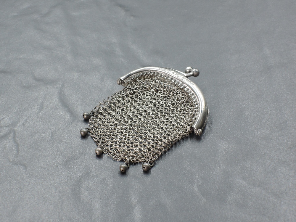 An imported silver mesh coin purse, of traditional design, import marks for London 1915, maker Cohen