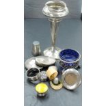 A small lot of sundry silver items, to include dressing jar covers, vase, napkin ring and small