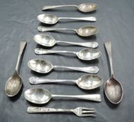 A group of miscellaneous silver coffee spoons and a single pickle fork, 124grams gross.