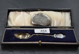 An Edwardian silver vesta case, of kidney shape with foliate engraved decoration, marks for