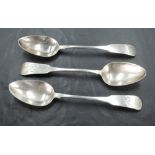 Three Queen Anne silver dessert spoons of fiddle back pattern having monogram to terminals and