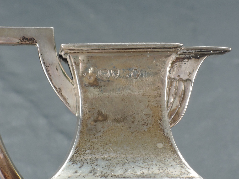 A Victorian silver cream jug, of square section baluster form with angular handle and half fluted - Image 2 of 3
