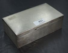 A 1960's silver cigarette box, of hinged rectangular form with engine-turned decoration and vacant